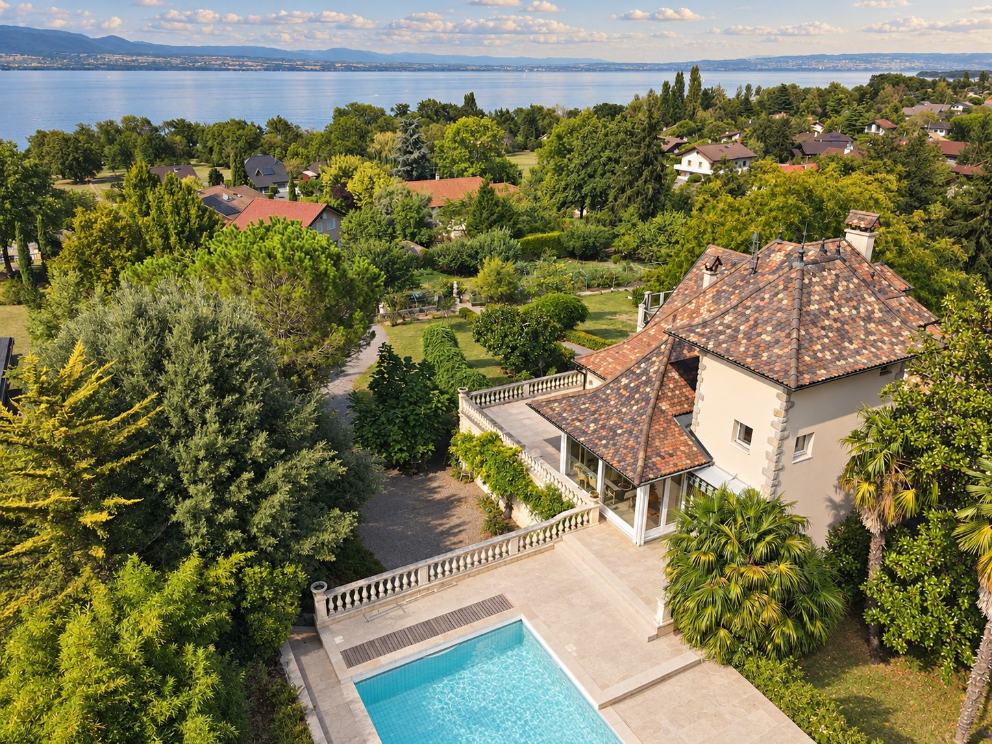 The tower and pool from above, with Lake Léman and the far shore. Enhanced photograph.